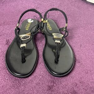 Guess Black T-Strap Sandals with Gold Accents